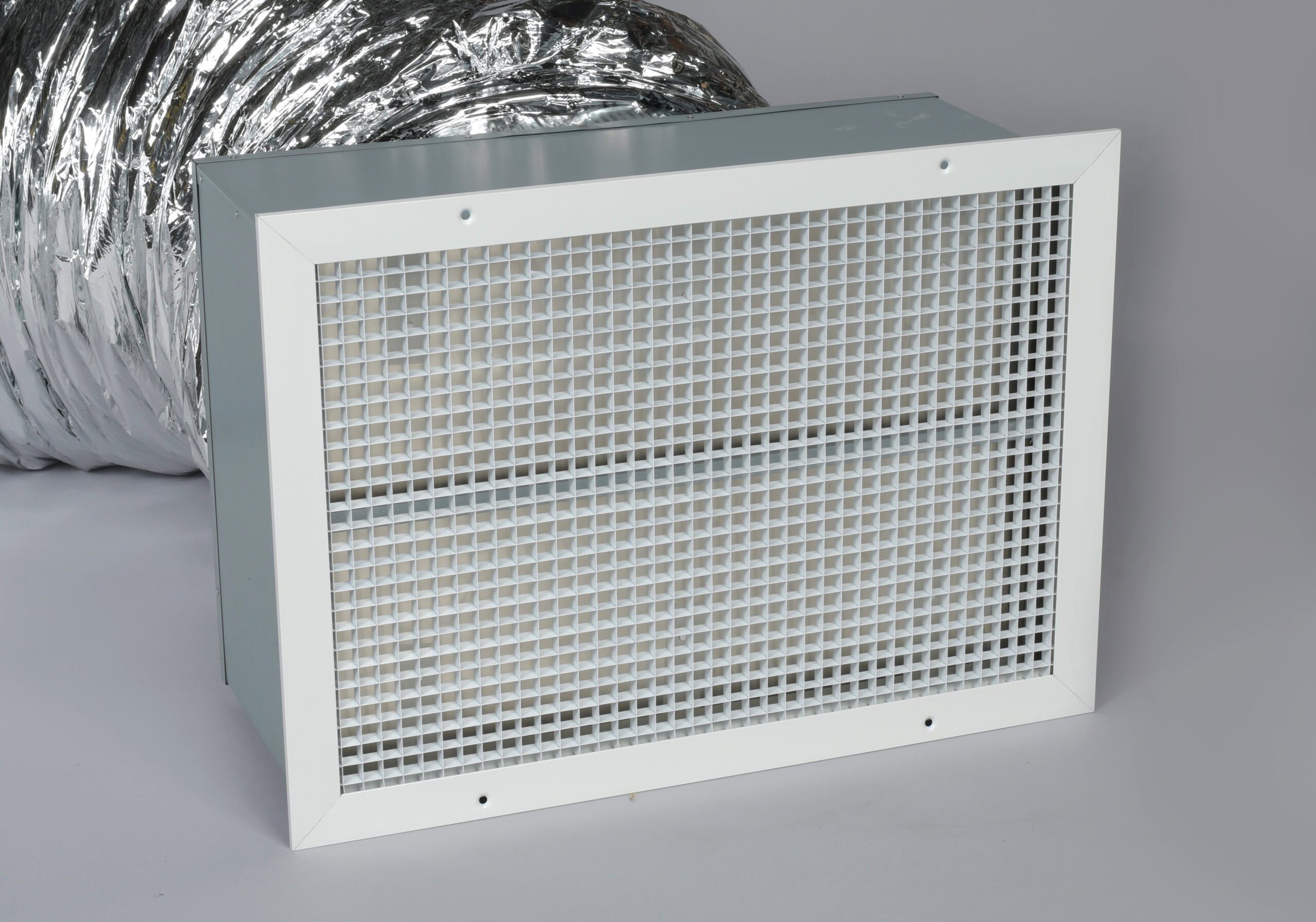 A photo of the damper box and grille of a QA-Deluxe Whole House Fan.